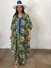 Load image into Gallery viewer, slow fashion sustainable light tropical clothing made in Panama, national talent direct to your home. Nido Shop pros at integrating local indigenous art with easy to wear cool contemporary clothing and beachwear. You feel blessed, want to relax and make good social choices. We love working with Guna molas and Ngabe pintas and supporting local artisans artesanal    slow fashion sustainable light trop
