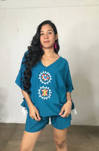 Load image into Gallery viewer,  slow fashion sustainable light tropical clothing made in Panama, national talent direct to your home. Nido Shop pros at integrating local indigenous art with easy to wear cool contemporary clothing and beachwear. You feel blessed, want to relax and make good social choices. We love working with Guna molas and Ngabe pintas and supporting local artisans artesanal
